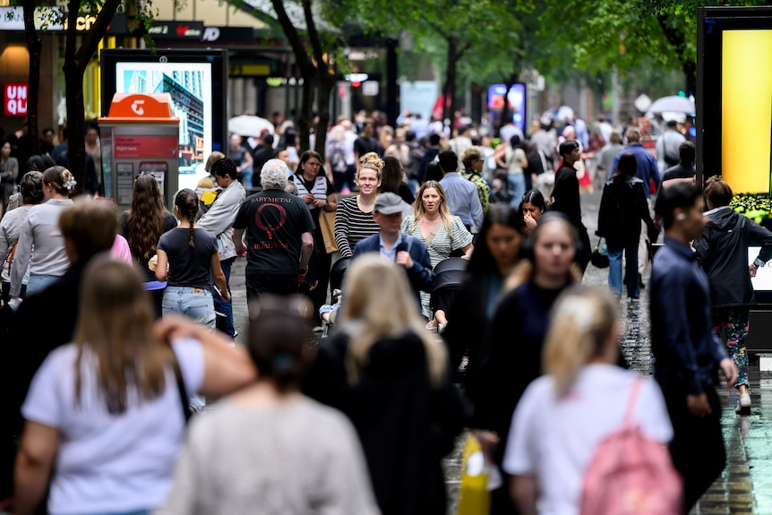 Group of people shopping on a cloudy day